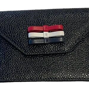 Black Textured Clutch with Tricolor Bow